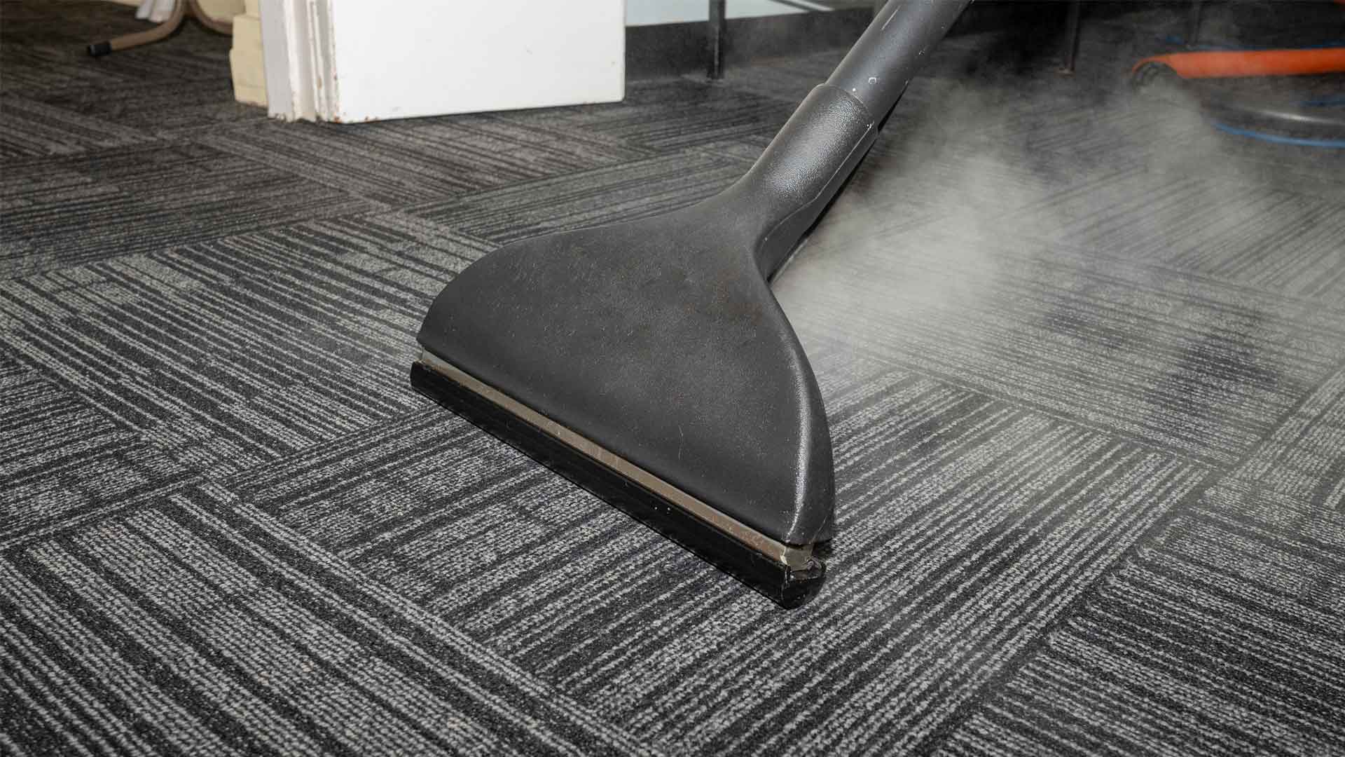 Carpet steam cleaning with a cleaning wand. Carpet steam cleaning with a cleaning wand.